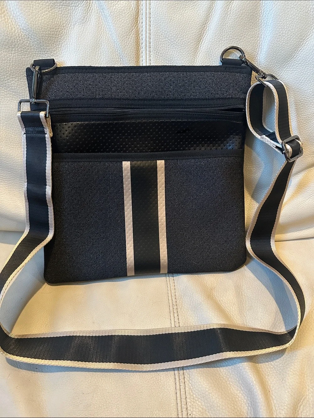 HAUTE SHORE Black Crossbody with Tan Striped Strap and Accents